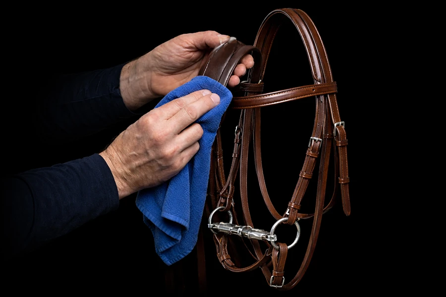 Conditioning saddle leather